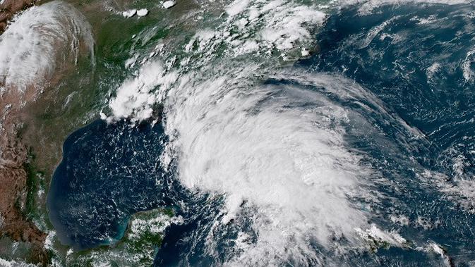 Ilustrasi badai (NOAA via AP)