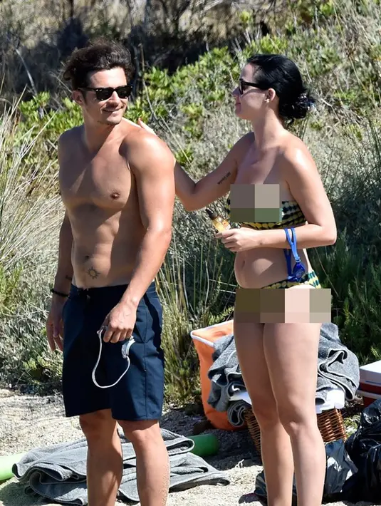 Kemesraan mereka sebagai pasangan kekasih juga tak sebatas berpelukan dan berciuman, namun lebih dari hal itu. Orlando Bloom juga melakukan hal vulgar dan senonoh didepan umum. (Dailymail/Bintang.com)
