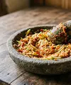 Resep Sambal Mangga Muda Terasi yang Segar dan Pedas Mantap. (AI Generated)