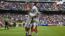 Pemain Real Madrid merayakan gol Jese Rodriguez pada menit ke-83 (AP Photo/Andres Kudacki)