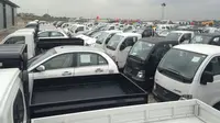 Tata Motors Petik Momentum Manis