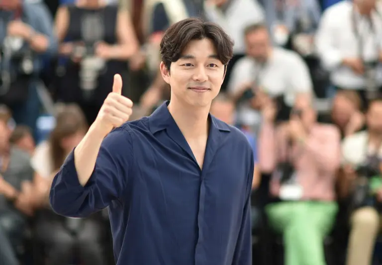 Agensi Gong Yoo memperingatkan bahwa aktornya tak memiliki akun media sosial. (AFP/ALBERTO PIZZOLI)