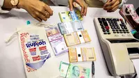 Sengaja Merusak Uang Rupiah Bisa Kena Pidana? Ini Aturan Lengkapnya