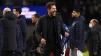 Hasil tersebut membuat Atletico Madrid lolos ke babak 16 besar Liga Champions 2021/2022 dengan titel runner-up Grup B di bawah Liverpool. Diego Simeone dan anak asuhnya berhasil meraih tujuh poin, unggul dua angka dari FC Porto. (AFP/Miguel Riopa)