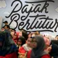 400 siswa dari 4 kampus di Jakarta mengikuti sosialisasi tentang Pajak Bertutur yang di selenggarakan oleh Dirjen Pajak Jakarta Barat, Jumat (11/8). (Liputan6.com/Johan Tallo)