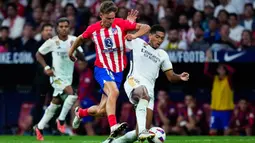 Atletico Madrid mencatatkan penguasaan bola 35 persen, sementara Real Madrid 65 persen. (AP Photo/Manu Fernandez)