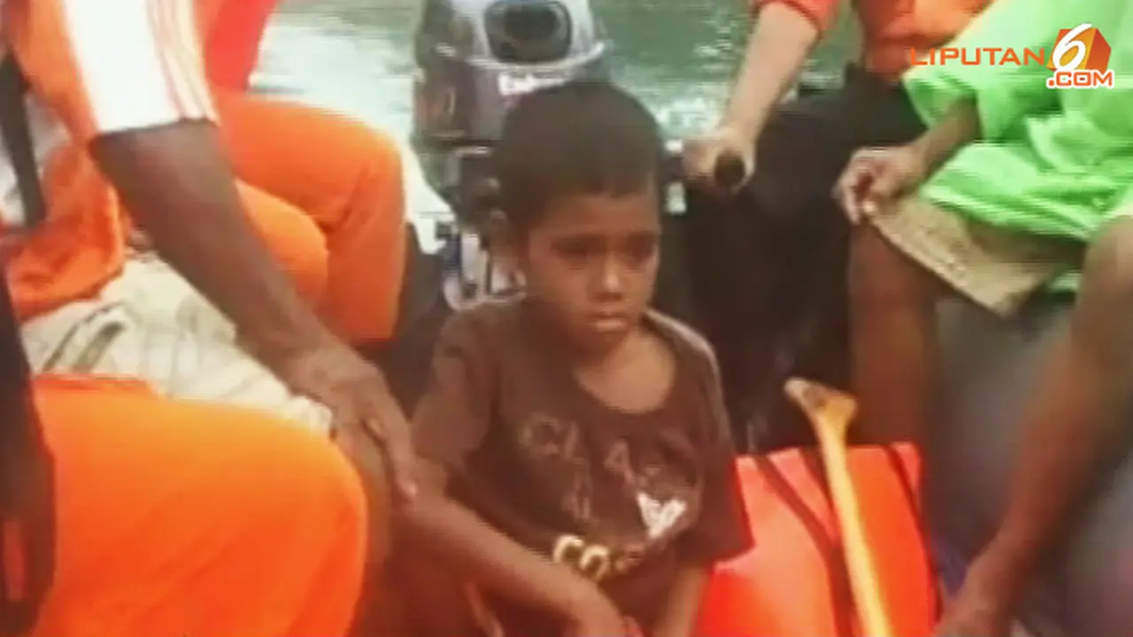 bocah-korban-banjir-130728b.jpg