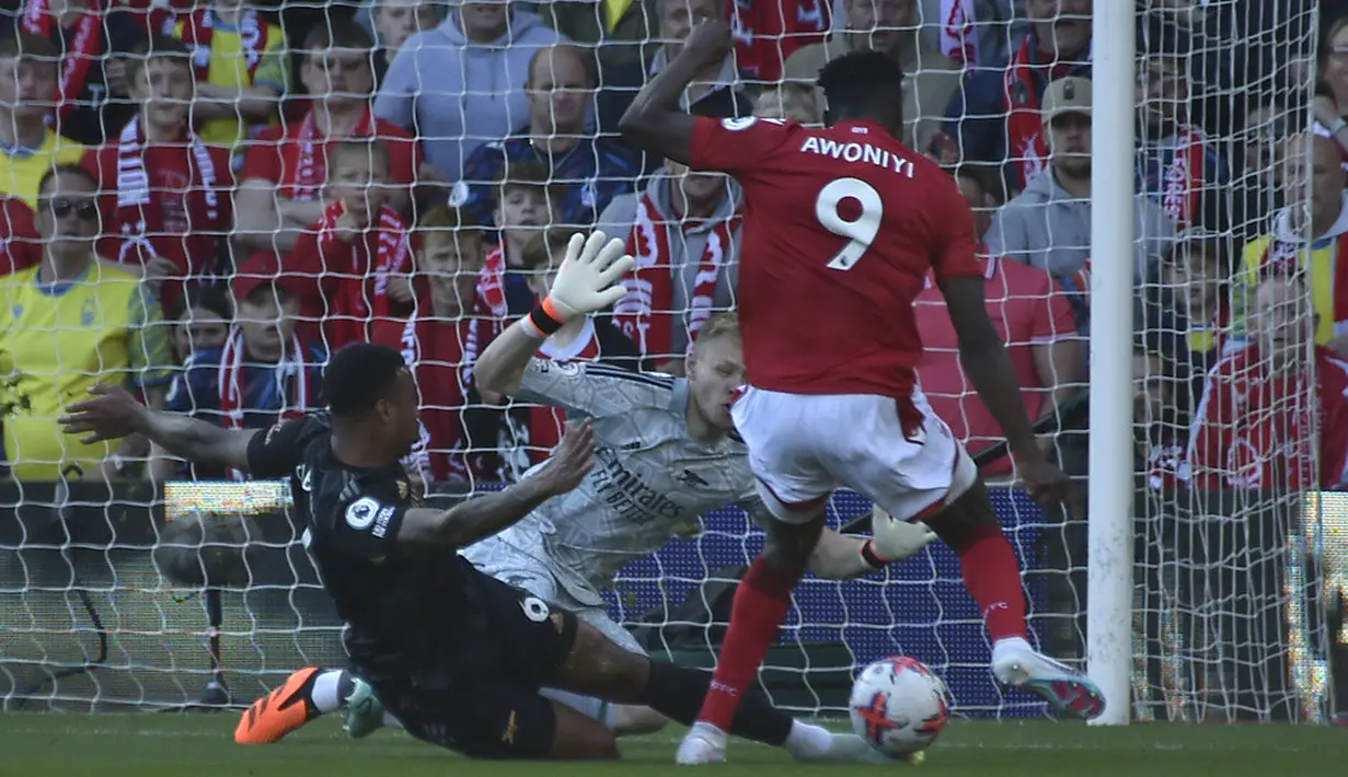 <p>Dijamu Nottingham di City Ground, Arsenal harus menelan kekalahan 0-1. Akibatnya pasukan Mikel Arteta sudah tak bisa mengejar Manchester City lagi di puncak klasemen Liga Inggris. (AP Photo/Rui Vieira)</p>
