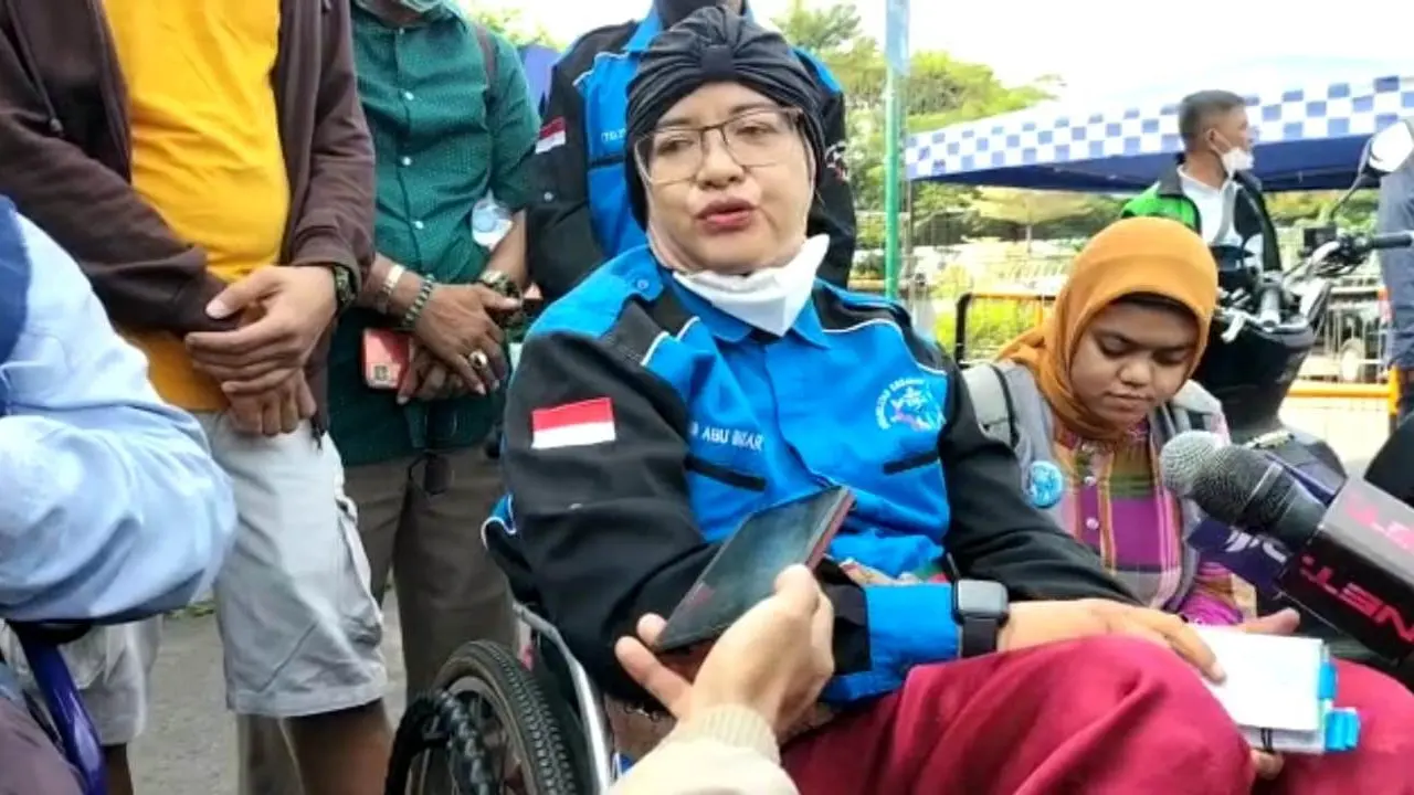 Kebahagiaan Difabel dapat Tiket Gratis Formula E (Liputan6.com/Ady Anugrahadi)