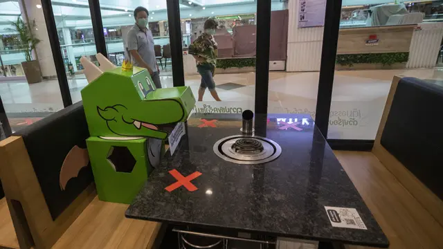 FOTO: Restoran di Thailand Gunakan Boneka Naga untuk Jaga Jarak