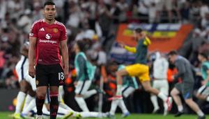 Gelandang Manchester United asal Brasil #18, Casemiro, bereaksi di akhir pertandingan final Liga Europa UEFA antara Tottenham Hotspur dan Manchester United di Stadion San Mames, Bilbao, pada 21 Mei 2025. (CESAR MANSO/AFP)
