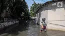 Pada Senin 7 Juli 2025 siang, Badan Penanggulangan Bencana Daerah (BPBD) DKI melaporkan sebanyak 58 Rukun Tetangga (RT) di Jakarta masih terendam banjir. (Liputan6.com/Herman Zakharia)