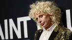 Penyanyi Lady Gaga saat berpose saat menghadiri fashion show koleksi Saint Laurent di Hollywood Palladium, California, (10/2). Lady Gaga tampil tomboy saat mengahdiri acara fashion tersebut. (REUTERS / Mario Anzuoni)