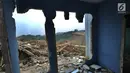 Kondisi rumah yang terkena proyek pembangunan Bendungan Ciawi di Desa Gadog, Bogor, Jawa Barat, Kamis (22/08/2019). Pembebasan lahan proyek pembangunan Bendungan Ciawi sudah lebih dari 90 persen. (Merdeka.com/Arie Basuki)