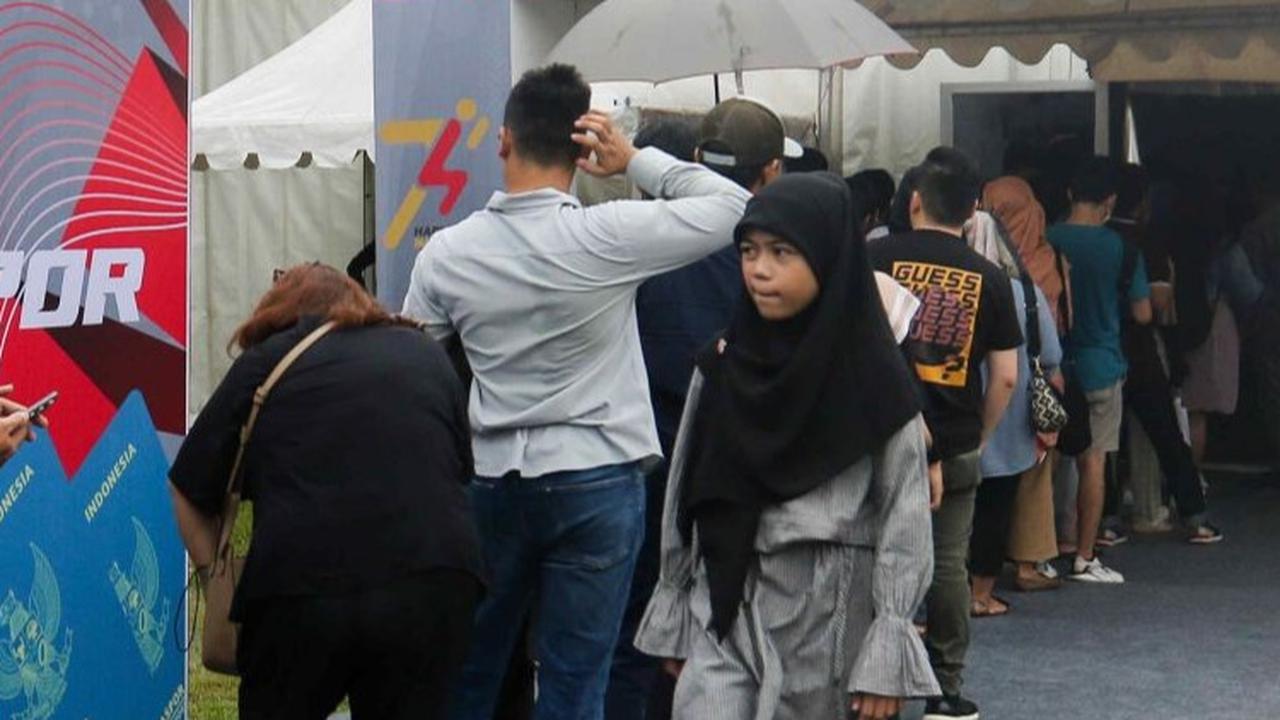 FOTO: Rayakan Hari Jadi Imigrasi ke-74, Antrean 1.074 Pemohon Paspor Pecahkan Rekor saat Car Free Day Jakarta