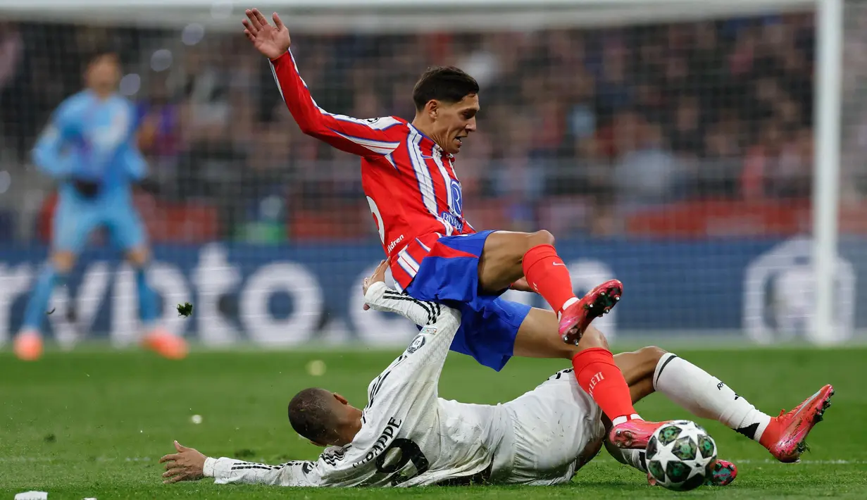 Berstatus tuan rumah, Atletico Madrid bermain agresif. (Oscar DEL POZO CA—AS/AFP)