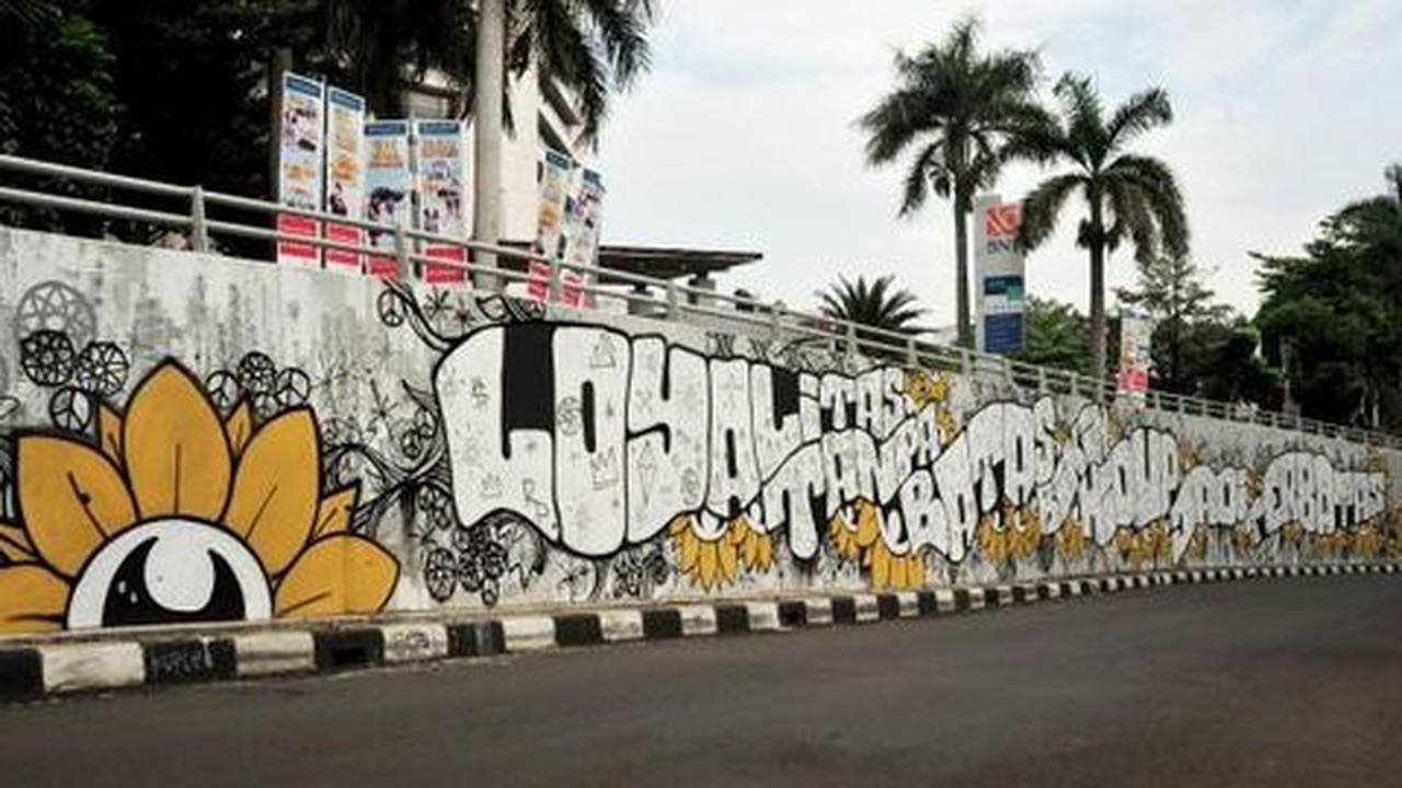 Ketika graffiti menyindir pekerja lupa diri