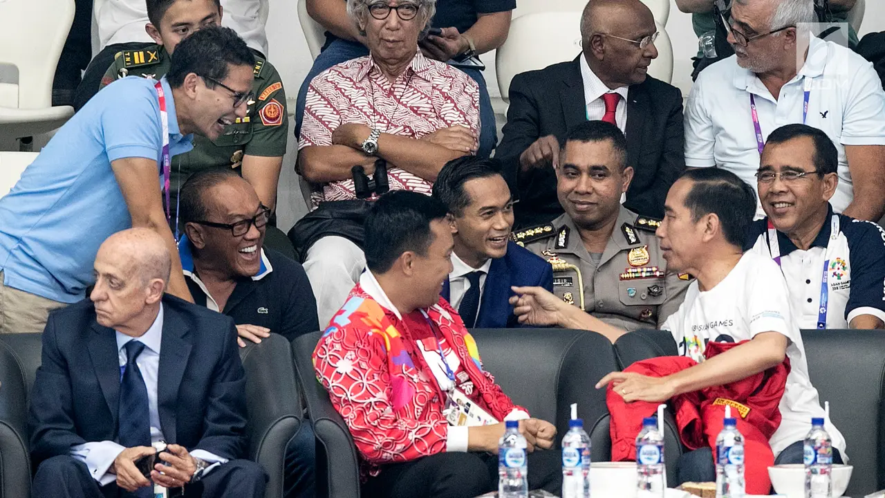 Keakraban Jokowi dan Sandiaga Uno di Asian Games 2018