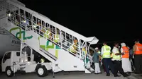 Jemaah haji K‎loter 1 Solo tiba di Bandara Adi Soemarmo, Minggu (18/9/2016) malam. (Liputan6.com/Fajar Abrori)