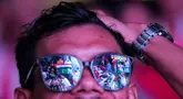 Refleksi tayangan layar saat Timnas Indonesia U-23 kebobolan olah Irak ketika nonton bareng perebutan peringkat ketiga Piala Asia U-23 2024 di Kompleks Monumen Nasional (Monas), Jakarta, Kamis (03/05/2024). (Bola.com/Bagaskara Lazuardi)