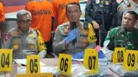Kapolres Bitung AKBP Tommy Souissa saat jumpa pers di Mapolres Bitung, Minggu (26/11/2023).