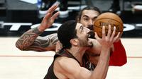 Bintang Portland Trail Blazers, Enes Kanter tetap berpuasa selama bulan Ramadan. (Steph Chambers / GETTY IMAGES NORTH AMERICA / Getty Images via AFP)