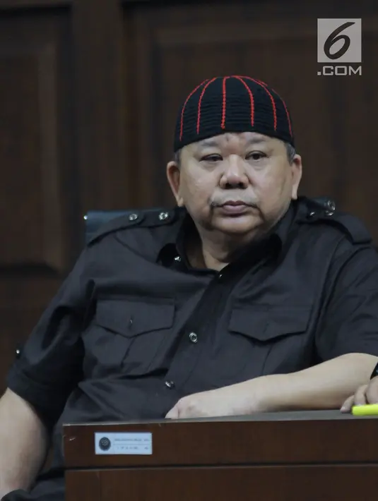 Terdakwa suap pemberian izin lokasi perkebunan di Kutai Kartanegara, Hery Sutanto Gun menyimak keterangan saksi pada sidang lanjutan di Pengadilan Tipikor, Jakarta, Selasa (27/3). Sidang mendengar keterangan saksi. (Liputan6.com/Helmi Fithriansyah)