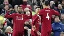Gelandang Liverpool, Georginio Wijnaldum, melakukan selebrasi usai membobol gawang West Ham United pada laga Premier League di Stadion Anfield, Inggris, Selasa (25/2/2020). Liverpool menang dengan skor 3-2. (AP/Jon Super)