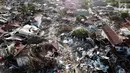 Pandangan udara Perumnas Balaroa yang rusak dan ambles akibat gempa bumi Palu, Sulawesi Tengah, Jumat (5/10). Kejadian berawal saat gempa Palu yang mengakibatkan bangunan roboh dan tanah longsor. (Liputan6.com/Fery Pradolo)