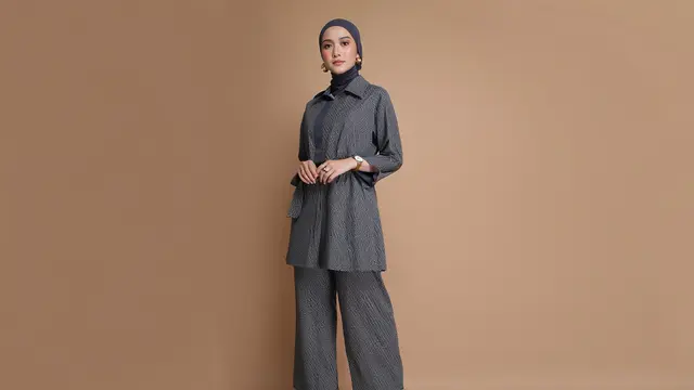 Model Baju Batik Terbaru yang Cocok untuk Wanita Berhijab/Ilustrasi oleh AI