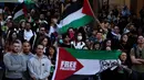 Para pengunjuk rasa meneriakkan slogan-slogan saat mereka berbaris dalam aksi protes menentang aksi militer Israel di Gaza, di Sydney pada 9 Oktober 2023, (David GRAY/AFP)