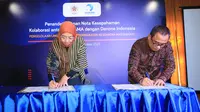 Danone Indonesia bersama Keluarga Alumni Gadjah Mada (KAGAMA) menandatangani nota kesepahaman. (Liputan6.com/ ist)