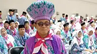 Afifi, Calon Haji Nyentrik Bertopi Unik