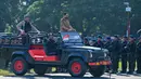 Upacara Hari Bhayangkara ke-79 di Banda Aceh dipimpin langsung Gubernur Aceh, Muzakir Manaf di di Lapangan Blang Padang, Kota Banda Aceh, Selasa, 1 Juli 2025. (CHAIDEER MAHYUDDIN/AFP)