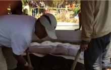 Makam asisten bos XL dibongkar, keluarga histeris