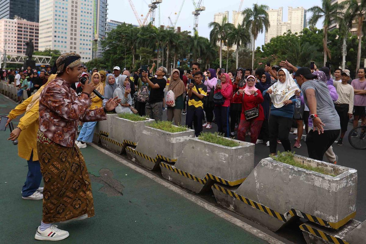 FOTO: CFD Jakarta Kembali Bergairah, Warga Sesalkan Aksi Demonstrasi Anarkis