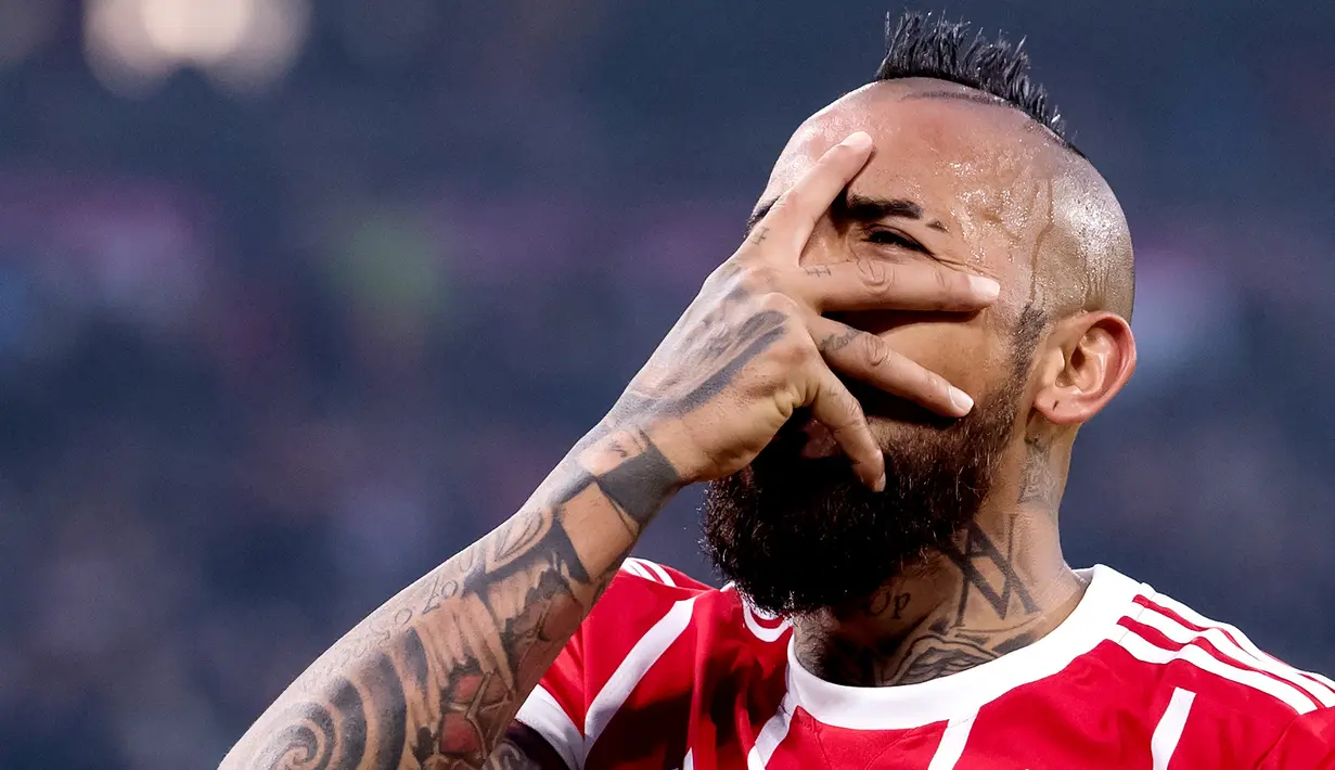 3. Arturo Vidal – Pesepakbola nyentrik asal Chile ini pernah mengatakan nyaman dan tak akan meninggalkan kota Turin. Pada 2015 dia resmi bergabung ke Bayern Munchen dan di sana hingga 2018. (AFP/Sven Hoppe)