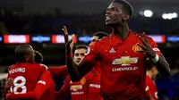 Gelandang Manchester United, Paul Pogba, berhasil mencetak dua gol dan satu assist sekaligus membantu timnya menang 4-1 atas Bournemouth di Old Trafford, pada laga pekan ke-20 Premier League, Minggu (30/12/2018). (AP Photo/ Jon Super)