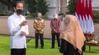 Acara penyerahan Banpres Produktif Usaha Mikro (BPUM) di Istana Kepresidenan, Jakarta, Jumat (30/7).