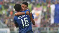 Rifaldi Bawuoh jadi satu di antara pahlawan Arema FC ketika menaklukkan Madura United 2-0 di Stadion Kanjuruhan, Malang, Jumat (8/11/2019). (Bola.com/Iwan Setiawan)