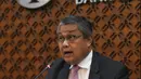 Gubernur Bank Indonesia (BI), Perry Warjiyo saat memberikan paparan hasil Rapat Dewan Gubernur (RDG) di Jakarta, Kamis (21/2). BI kembali menahan suku bunga acuan BI 7-Days Reverse Repo Rate (BI7RRR) di angka 6 persen. (Liputan6.com/Angga Yuniar)