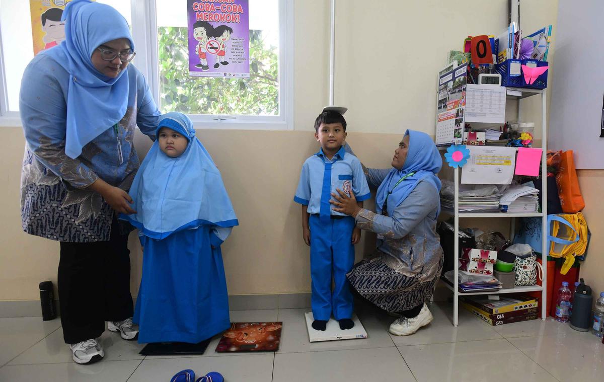 FOTO:  Antusias Murid SD Ikuti Cek Pemeriksaan Gratis di Sekolah