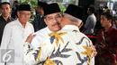 Ketua MA, Hatta Ali (kiri) disambut Plt Ketua KPK, Taufiequrachman Ruki saat menghadiri acara buka puasa bersama di Gedung KPK, Jakarta, Kamis (9/7/2015). Presiden dan Wapres ikut hadir dalam acara tersebut. (Liputan6.com/Helmi Afandi)