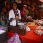 Menteri Keuangan Sri Mulyani bersama pedagang Pasar Besar Kota Malang, Jawa Timur (Liputan6.com/Zainul Arifin)