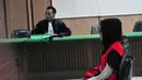 Assyifa Ramadhani duduk di bangku persidangan, Jakarta, Selasa (28/10/2014).. Sidang ke-11 ini ditunda hingga pekan depan karena berkas jaksa penuntut umum (JPU) belum siap. (Liputan6.com/Johan Tallo)