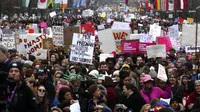 Ratusan ribu orang turun ke jalan pasca-pelantikan Donald Trump sebagai presiden ke-45 AS (Associated Press)