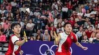Ganda putri Indonesia Apriyani Rahayu/Siti Fadia Silva Ramadhanti takluk dari pasangan China Chen Qing Chen/Jia Yi Fan pada laga kedua Grup A cabang olahraga bulu tangkis Olimpiade Paris 2024. Hasil ini membuat Apri/Fadia gugur di babak penyisihan grup. foto:&nbsp;PBSI/Badmintonphoto/Mikael Ropars)