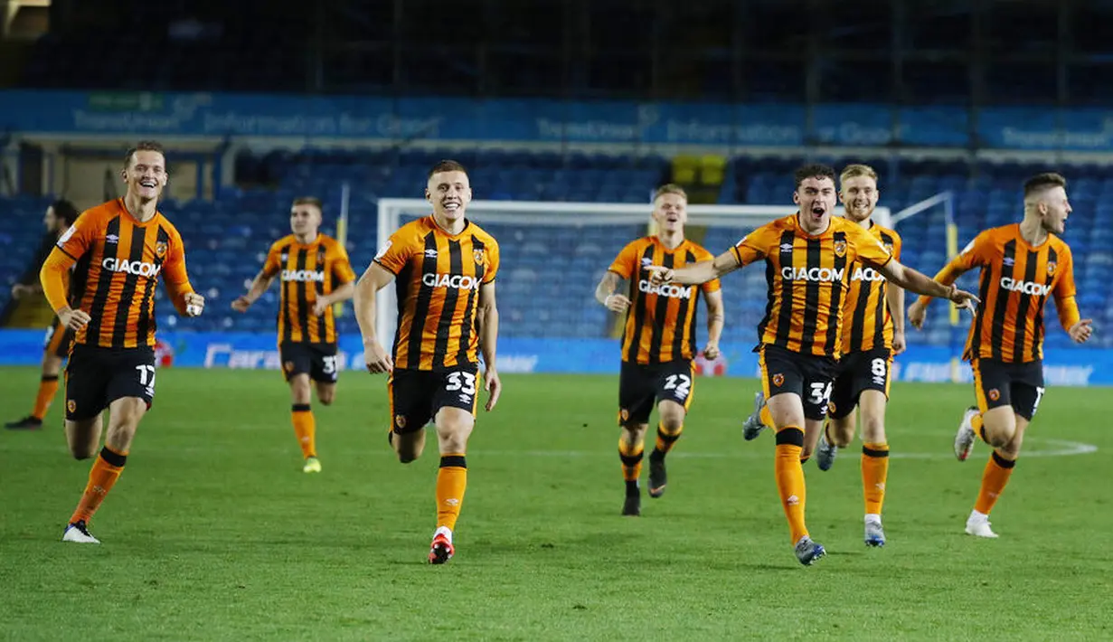 Pemain Hull City merayakan kemenangan atas Leeds United pada laga Piala Liga Inggris di Ellan Road, Kamis (17/9/2020). Hull City menang adu penalti dengan skor 9-8. (Phil Noble/Pool via AP)