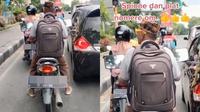 Seorang kakek mengendarai motor dengan spion dan pelat nomor berukuran besar. (Instagram/@newdramaojol.id)