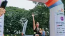 <p>Gisel pun akhirnya menyelesaikan lomba triathlon sambil memasang wajah bahagia. [Foto: instagram.com/gisel_lainstagram.com/gisel_la]</p>